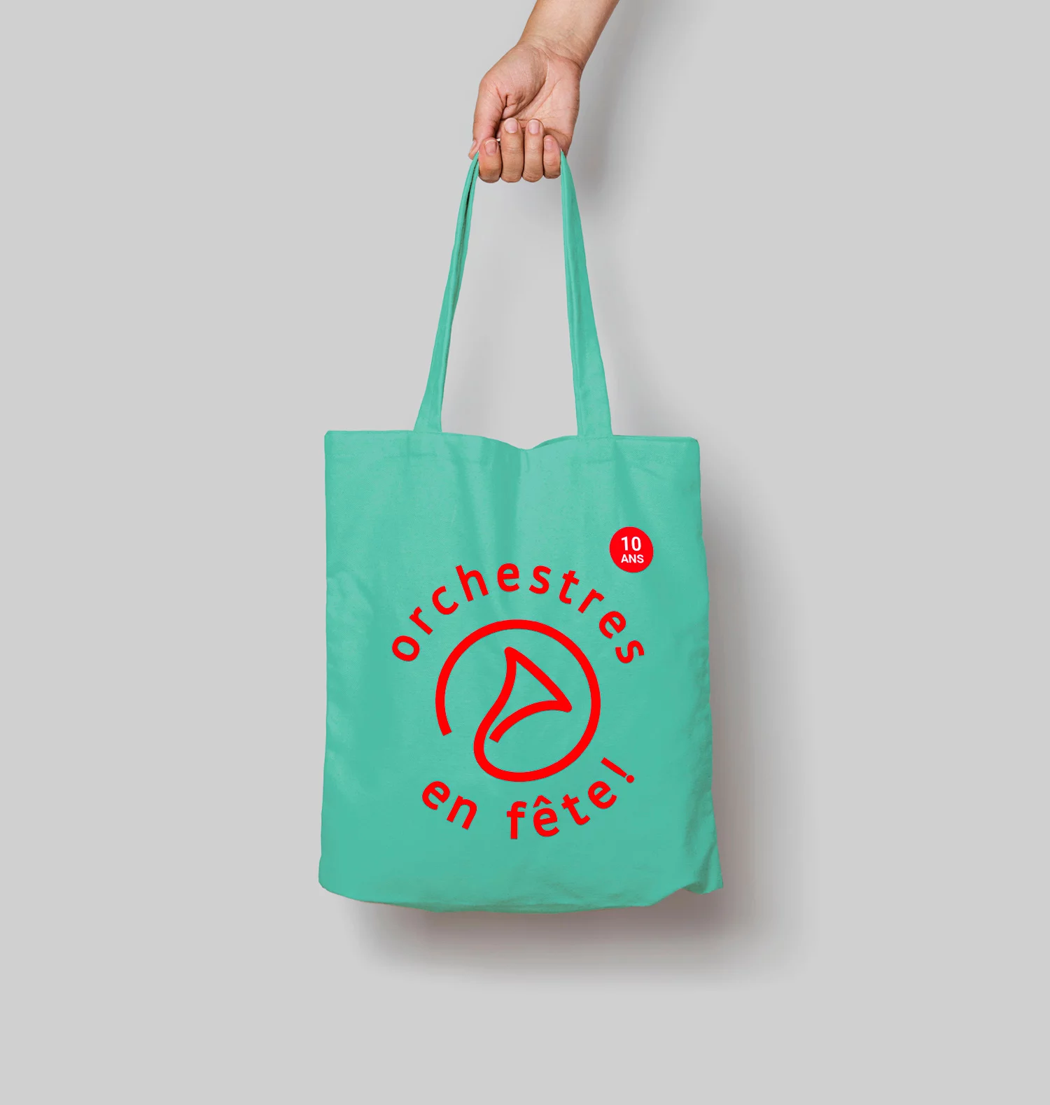 Tote bag vert avec le logo "Orchestres en fête" rouge imprimé dessus