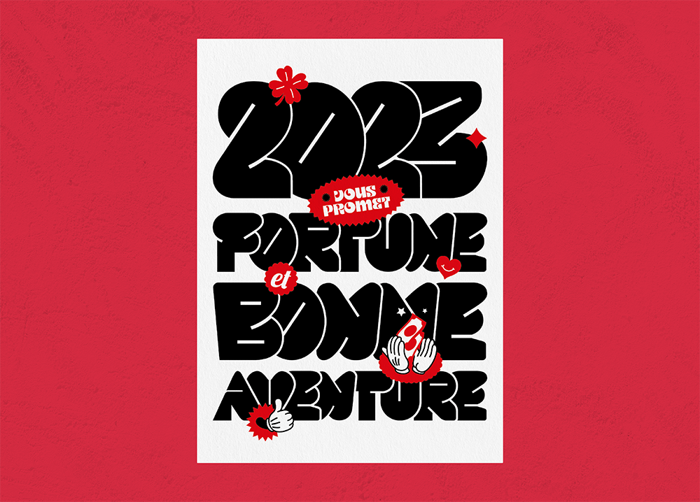 carte de voeux avec des décorations noires et rouges sur fond blanc, on y lit : 2023 vous promet fortune et bonne aventure