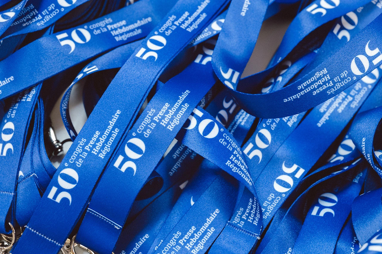 Design en situation du logo du 50e Congrès de la Presse Hebdomadaire Régionale